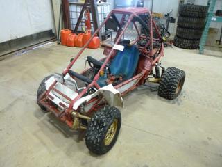 1985 Honda Odyssey Dune Buggy c/w A/T, 21x7.00-10 Front Tires, 22x11-10 Rear Tires, 1 7/8 In. Welded On Hitch, VIN JH3TE0209FC105299 *Note: Running Condition Unknow, No Key, Missing Air Intake, Broken Tire Seals, Damage To Body, Rear and Front Fenders* (X-1-1)