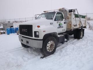 1998 GMC C7500 Dump Truck c/w 3126 CAT Diesel, 6 Speed, Showing 217,034 Kms, GVWR 14,968 KG, 11R22.5 Dually, Spring Susp, Roll Tarp, 12 Ft. Box, CVIP 06/20, VIN 1GDL7H1C1WJ521307 *Note: No Key, Broke Off In Ignition, Drive Shaft Disassembled, Major Rust On Dump Box, Engine Seized*
