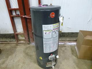2012 Rheem 40 Gallon Gas Water Heater, 22 In. x 50 In. *Note: Unused As Per Consignor* (Row 4)