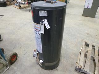 2012 Rheem 40 Gallon Gas Water Heater, 22 In. x 50 In. *Note: Unused As Per Consignor* (Row 4)