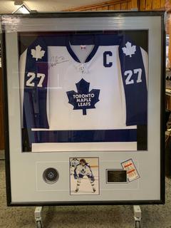 Framed Toronto Maple Leafs Jersey Signed by Darryl Sittler c/w Hockey Puck, Photograph, Plaque, Game Tickets and Certificate of Authenticity. (# 303/650)