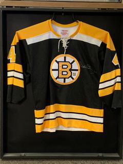 Framed Boston Bruins Jersey Signed by Bobby Orr.