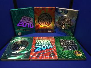 (6) Assorted Guinness Book of World Records Hard Cover Books.