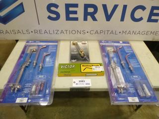 (2) Miller Combination Torch Tip Packs, (1) Victor Welding Nozzle, (1) Century Brasshead Welding Cutting Attachment (G-1)