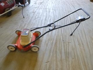 Sunbeam Electric Lawn Mower (East Wall)