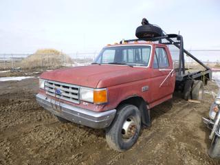 1988 Ford Super Duty Custom Flat Deck c/w 7.5L E.F.I., Showing 232,782 Kms, 309 Hours, 5 Speed, A/C, 235/85R16 Tires at 20%, Tow Behind Arm, Deck Length 9 Ft. 3 In., 7 Ft. 2 In. Wide, VIN 2FDLF47G3JCA81071 *Note: Running Condition Unknown, Needs Fuel Pump As Per Consignor, Rust On Body, Hole In Floor*