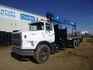 1987 Ford L9000 Picker Truck c/w CAT Diesel, 8LL Road Ranger Manual Transmission, Showing 230,882 Kms, 7,978 Hours, GVWR 64,000 Lb., 225 In. W/B, PTO, Beacons, 445/65R22.5 Tires at 80%, 12R22.5 Rear Tires at 60%, Front Axle Rating 9,071 KG, Rear Axle Rating 19,956 KG, 19 Ft. 4 In. x 8 Ft. 4 In., Double Frame,  w/ National Crane 600B, 28,000 Lb Gap, Out Riggers, Last Inspected Aug. 2014, SN 1608, VIN 1FDZY90XZHVA50779 *Note: 35Ft Jib to Be Sold As Lot 0585*