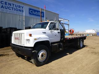 1991 GMC Top Kick Flat Deck c/w CAT/3116 Diesel, A/T, Showing 37,655 Kms, 11,621 Hours, Sunroof, Storage Cabinet, Tire Chains, GVWR 16,466 KG, 209 In. W/B, 11R22.5 Tires at 70%, Dually 11R20 Rears at 70%, Front Axle Rating 5,978 KG, Rear Axle Rating 10,433 KG, VIN 1GDM7JIJ8MJ504343 *Note: Damage To Deck Board*