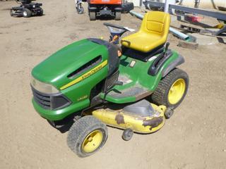 John Deere 0130A Ride-On Lawn Mower c/w Briggs and Stratton OHV Twin, 21 HP, 48 In. Deck, 16x6.50-8 NHS Front Tires at 40%, 22x9.50-12 NHS Rears Tires at 40%, SN GX0130A044514  (East Side Wearhouse)