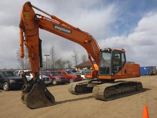 2011 Doosan DX225LC Excavator c/w Diesel, Showing 8,687 Hours, TBG, Undercarriage 35%, 36 In. Bucket and Thumb, SN DHKCEBADAB0006314 *Note: Loose Pads, Dented Body*
