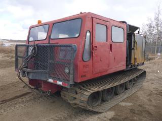 Nodwell FN60 c/w Detroit Diesel, 4 Speed Manual, Showing 1,782 Hours, 34 In. Tracks, 8 Ft. x 3 Ft. 9 In. x 4 Ft. Steel Tank, Crew Cab, SN 50337001  (East Fence)