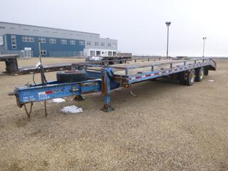 2005 Double A 30 Ft. T/A Flat Deck Trailer c/w Pintle Hitch, Air Brakes, 235/75R17.5 Tires, 5 Ft. 2 In. Beaver Tail, 6 Ft. Ramp, VIN 2DABC82435T004526  *Located At Satellite Yard*