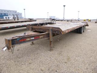 2001 Norberts 30 Ft. T/A Flat Deck Trailer c/w Pintle Hitch, ST235/80R16 Tires, 4 Ft. Beaver Tail, 4 Ft. 7 In. Ramp VIN 2N9DASC271G017193 *Note: VIN OBL* *Located At Satellite Yard*