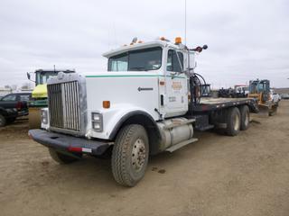 1996 International 9300 GLR Deck Truck c/w Cummins 855 Diesel, 6 + 4 Spicer Transmission, Showing 526,386 Miles, A/C, PTO, Beacons, Headache Rack, Storage Cabinet, GVWR 23,000 KG, 252 In. W/B,  65,000 Lb Tulsa Winch, 14 Ft Deck, 58 In Ramp, 60 In Beaver Tail, 12R22.5 Tires at 40%, 11R24.5 Rears, VIN 2HTFC0003TC059660 *Note: Some Damaged Deckboards*