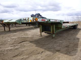 1981 Roadmaster 34 Ft. T/A Step Deck Trailer c/w End Roll, P/U Throat, Crank Landing Gear, 2 Legs, 11R24.4 Tires, VIN 814346 *Located Off Site at 607 17 Ave, Nisku, AB T9E 7T2, For More Information Contact Keith at 403-512-2504*