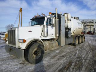 2004 Peterbilt Hydro Vac c/w CAT C15 Diesel, 18 Speed Eaton Fuller, Showing 237,763 Kms, 1,267 Hours, GVWR 56,000 Lb, 285 In. W/B, Diff Lock, Dbl Frame, PTO, Beacons, Storage Cabinet, Front Tires 445/65R22.5 at 60%, Rear Tires 11R24.5 at 75%, Front Axle Rating 12,000 Lb, Rear Axle Rating 66,000 Lb, Roots Rotery Lobe Blower, PTO Driven, Hyd Drive Pressure Pump, No Tank Info, Hyd Open Debris Gate, Remote, Boiler 4,382 Hours, Water Pump 0001 Hours, Blower 5,088 Hours, CVIP 05/2021, VIN 1XPFD49X74D820899