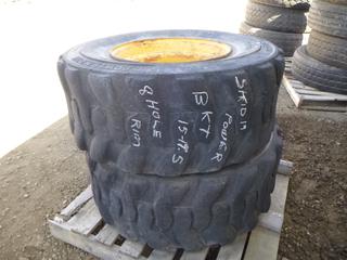 (2) Skid Steer 15-19.5 NHS Tires w/ Rims (Row 3)