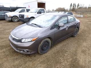 2012 Honda Civic 2WD c/w 1.8L, 5 Speed Manual, A/C, Showing 169,353 Kms, 195/65R15 Tires at 60%, VIN 2HGFB2E43CH027299