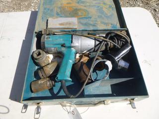 Makita 696 3/4" Impact Wrench, 120 Volts, Assorted Bits, Working Condition Unknown.
