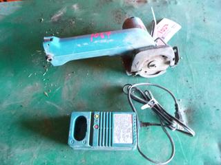Makita Circular Saw, Battery Charger, No Battery, Working Condition Unknown.