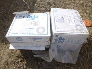 (4) Cases Of Delo Grease.