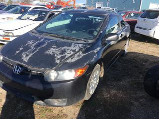 Selling Off-Site -  2006 Honda Civic 2 Door Car c/w 4 Cyl, Auto, With Key, Showing 324,416 Kms,  VIN 2HGFF12366H015031.  Location - 527 North 200 East, Raymond, AB -  For Further Information Please Call Chris 403-308-1161.