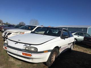 Selling Off-Site -  1991 Nissan NX1600 2 Door Car c/w 4 Cyl, 5 Spd, With Key, T Tops, Showing 411,466 KM, VIN JN1EB36S3MU001297.  Location - 527 North 200 East, Raymond, AB -  For Further Information Please Call Chris 403-308-1161.