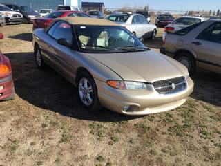 Selling Off-Site -  1996 Chrysler Sebring Convertible 2 Door Car c/w V6, Auto, With Key,  Unable To Verify Kms, VIN 3C3EL55H2TT285000.  Location - 527 North 200 East, Raymond, AB -  For Further Information Please Call Chris 403-308-1161.