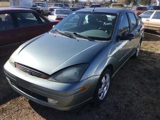 Selling Off-Site -  2004 Ford Focus 4 Door Car c/w 4 Cyl, Auto, With Key, Showing 117,515 Kms, Non Repair, VIN 1FAFP38314W141383.  Location - 527 North 200 East, Raymond, AB -  For Further Information Please Call Chris 403-308-1161.