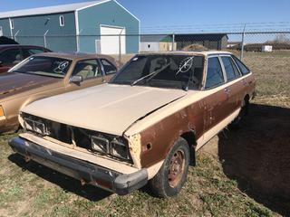 Selling Off-Site -  1981 Datsun S10 4 Door Hatch c/w 4 Cyl, 5 Spd, No Key, VIN JN1HT03S0BT204826.  Location - 527 North 200 East, Raymond, AB -  For Further Information Please Call Chris 403-308-1161.