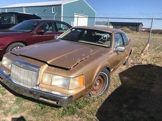 Selling Off-Site -  1984 Lincoln Continental Car c/w V8, Auto, No Key, VIN 1MRBP98F7EY630606.  Location - 527 North 200 East, Raymond, AB -  For Further Information Please Call Chris 403-308-1161.