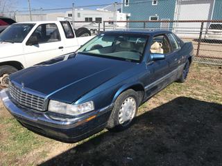 Selling Off-Site -  1992 Cadillac Eldorado 2 Door Car c/w V8, Auto, With Key, Showing 96,314 kms, VIN 1G6EL13B6NU621388.  Location - 527 North 200 East, Raymond, AB -  For Further Information Please Call Chris 403-308-1161.