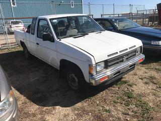 Selling Off-Site -  1990 Nissan Extended Cab 1/4 Ton c/w 4 Cyl, 5 Spd, No Key, Showing 141,978 Kms, VIN JN6SD16S5LW202553.  Location - 527 North 200 East, Raymond, AB -  For Further Information Please Call Chris 403-308-1161.