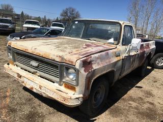 Selling Off-Site -  1973 Chev 30 1 Ton SRW 2WD c/w V8, 4 Spd, With Key, VIN CCY343J129488. Location - 527 North 200 East, Raymond, AB -  For Further Information Please Call Chris 403-308-1161.