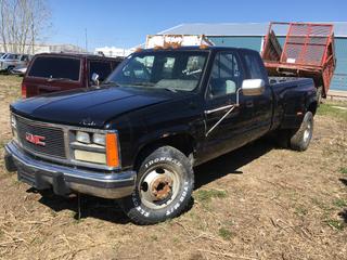 Selling Off-Site -  1988 GMC 1 Ton Extended Cab Dually P/U c/w V8, Auto, With Key, Long Box, Showing 180,298 Kms, VIN 2GTHC39N3J1561793. Location - 527 North 200 East, Raymond, AB -  For Further Information Please Call Chris 403-308-1161.