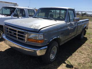 Selling Off-Site -  1993 Ford F150 4x4 P/U c/w V8, 5 Spd, With Keys, Long Box, Showing 242775 Kms, VIN 2FTEF14N8PCA61700. Location - 527 North 200 East, Raymond, AB -  For Further Information Please Call Chris 403-308-1161.