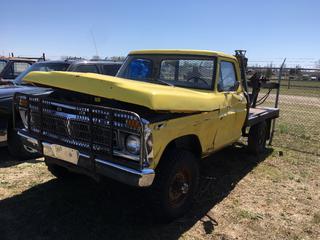 Selling Off-Site -  1977 Ford F250 4x4 Deck Truck c/w V8, 4 Spd, No Key, VIN F26HC042520. Location - 527 North 200 East, Raymond, AB -  For Further Information Please Call Chris 403-308-1161.