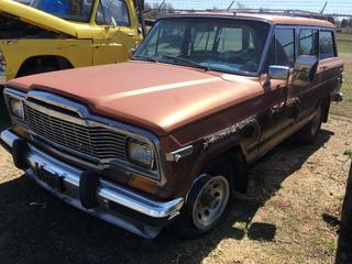 Selling Off-Site -  1981 Jeep Wagoneer c/w V8, Auto, With Key, Showing 92,761 Kms,  VIN 1JCNE15N4BT061174. Location - 527 North 200 East, Raymond, AB -  For Further Information Please Call Chris 403-308-1161.