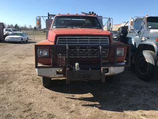 Selling Off-Site -  1982 Ford Welding Deck c/w Gas, 5+2, With Key, Showing 74042 Kms, VIN 1FDPF70H2CVA40109. Location - 527 North 200 East, Raymond, AB -  For Further Information Please Call Chris 403-308-1161.