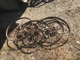 Selling Off-Site -  (6) Antique Steel Wheels. Location - 527 North 200 East, Raymond, AB -  For Further Information Please Call Chris 403-308-1161.
