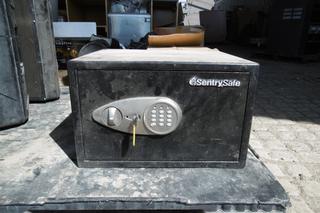 Sentry Safe w/ Key.