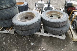 Set of (4) 19.5 Tires & Rims.