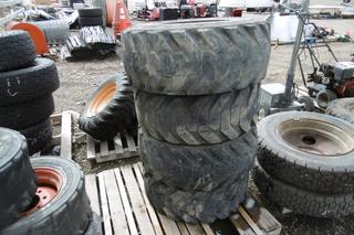 Set of (4) 12x16.5 Skid Steer Tires & Rims.