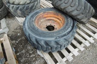 (1) 16.5 Skid Steer Tire & Rim, (1) 10x16.5 Tire & Rim.