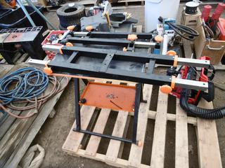 Portable Mitre Saw Table with roller stands.