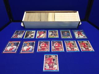 Approximately (500) 1989-90 O-Pee-Chee Assorted Hockey Cards, (300) 1989-90 Score Assorted Cards. 3 Theoren Fleury, 2 Gary Roberts, Joe Sakic, Martin Brodeur Rookie Cards.