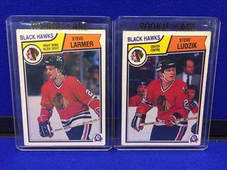 (2) 1983-84 Steve Larmer #105, Steve Ludzik #106 O-Pee-Chee Rookie ERROR Cards.