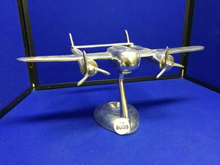 Silver/Metal Airplane Statue 18" Side, 7.5" Tall.