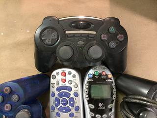 (3) Hip Gear Remotes & (2) TV Remotes.