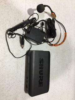 (1) Shure BLX 4 H8 Wireless Mic System.